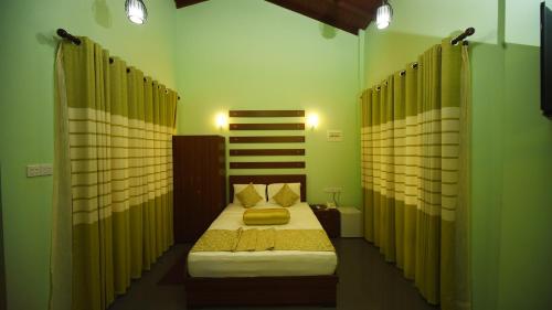 Katil atau katil-katil dalam bilik di Lavenro Garden