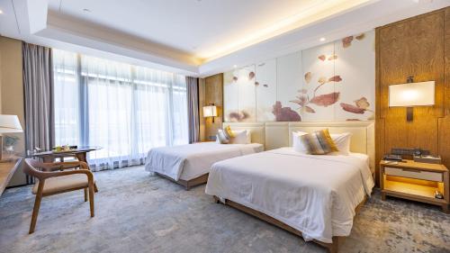 Katil atau katil-katil dalam bilik di Jinling Grand Hotel Nanchang