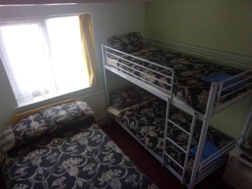 Ένα ή περισσότερα κρεβάτια σε δωμάτιο στο MyRoomz Golden Strand Hotel