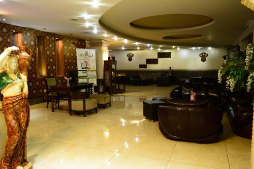 Un lugar para sentarse en Larsa Hotel