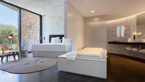 Postel nebo postele na pokoji v ubytování Son Brull Hotel & Spa