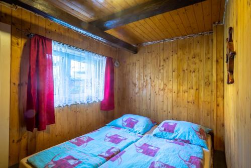 Apartmán u Šmídůにあるベッド
