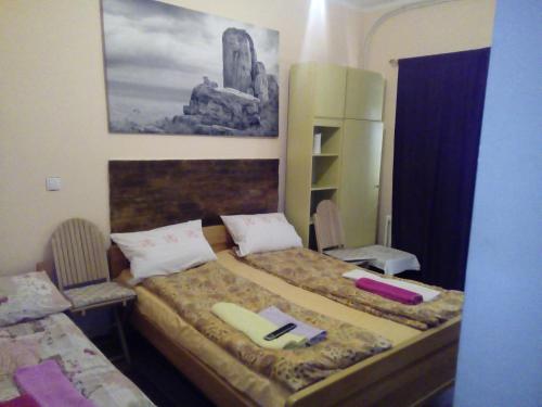 Кровать или кровати в номере Guest house Mirijevski Konak