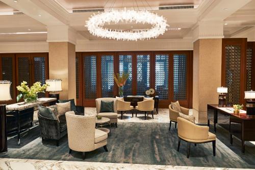 Et opholdsområde på The Capitol Kempinski Hotel Singapore