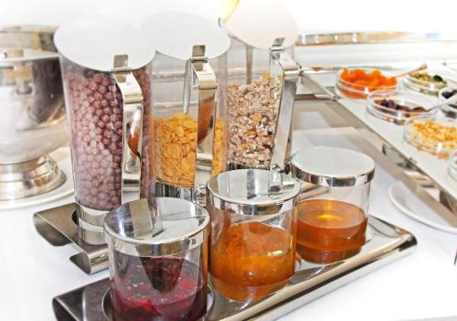 a buffet line with many different types of food at BoutiqueHotel Aristo in Białystok