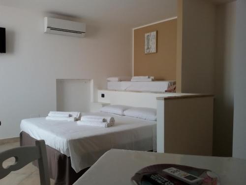 Ένα ή περισσότερα κρεβάτια σε δωμάτιο στο Casa Solarium