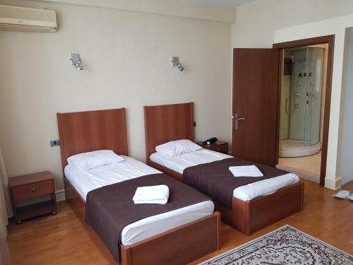 Кровать или кровати в номере Baku Sea View Hotel