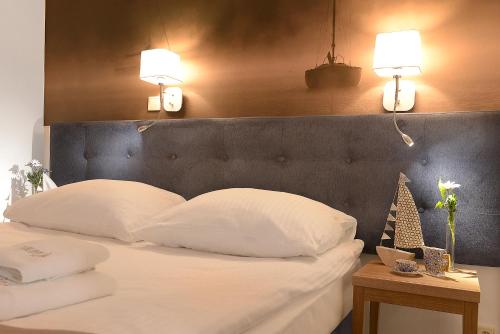 Hotel Skalny Spa Bieszczadyにあるベッド