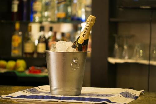 a bucket of ice and a bottle of champagne at Chateux De Atlantique Hotel in Lagos