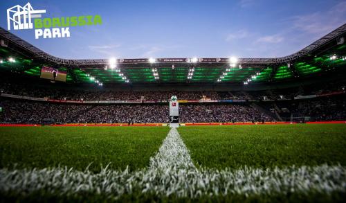 a soccer field with a crowd in a stadium at H4 Hotel Mönchengladbach im BORUSSIA-PARK in Mönchengladbach