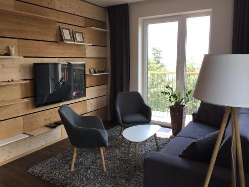 TV in/ali zabaviščno središče v nastanitvi A3 atri