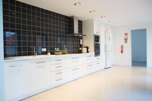 Η κουζίνα ή μικρή κουζίνα στο T2 Lux Casa das Pereiras