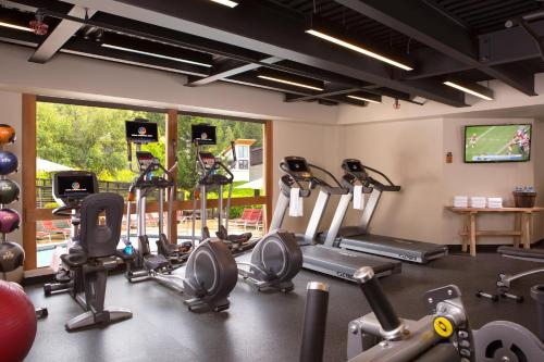 a gym with several treadmills and cardio machines at Snow King Resort in Jackson