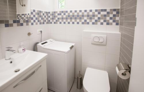 Apartment Optim tesisinde bir banyo