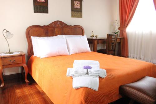 Ένα ή περισσότερα κρεβάτια σε δωμάτιο στο Casa Mora B&B