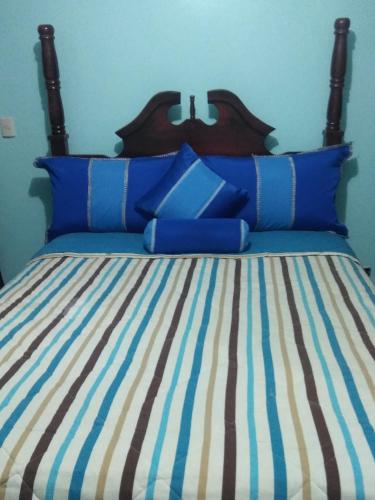 Una cama o camas en una habitación de Paradise 3 cerro Altos