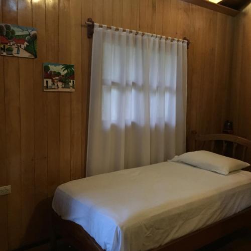 Cama o camas de una habitación en Hilamito Lodge