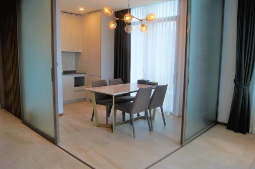 a dining room with a table and chairs at AM Hotel in Pyeongchang 