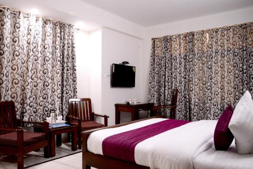 TV a/nebo společenská místnost v ubytování Hotel Sukhvilas
