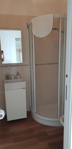 a bathroom with a shower and a sink at Il sogno di Ele in Polignano a Mare