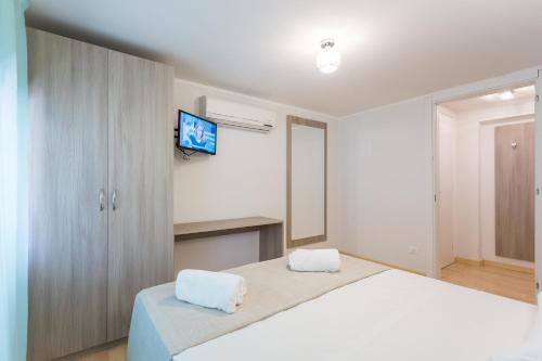 Ένα ή περισσότερα κρεβάτια σε δωμάτιο στο Luciano Laterani Guest House