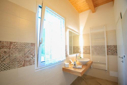 Ένα μπάνιο στο B&B Dimora ROSSIPINTI