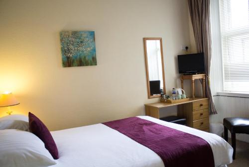 Posteľ alebo postele v izbe v ubytovaní Auld Manse Guest House