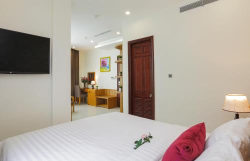 Cama ou camas em um quarto em Golda Hotel
