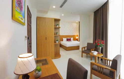 Ένα ή περισσότερα κρεβάτια σε δωμάτιο στο Golda Hotel