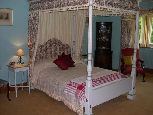 Lullington House tesisinde bir odada yatak veya yataklar