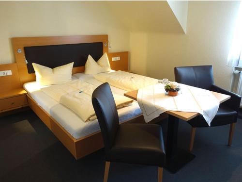 Katil atau katil-katil dalam bilik di Hotel Gasthaus Krone
