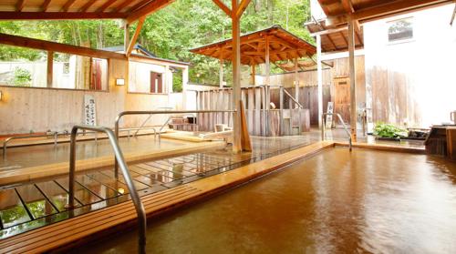 a house with a flooded floor with water in it at Ginsuisou Choraku in Kobe
