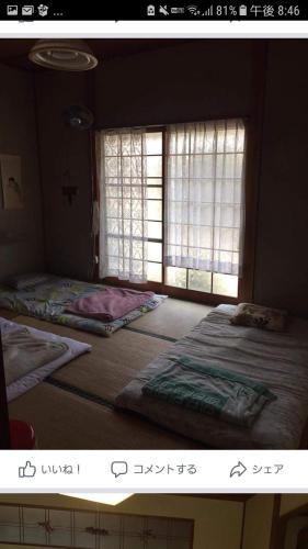 ホステル あまおうにあるベッド