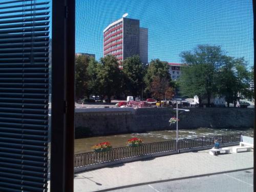 a view of a city skyline from a window at Рачо Ковача in Gabrovo