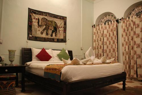 Cama o camas de una habitación en Malji Ka Kamra