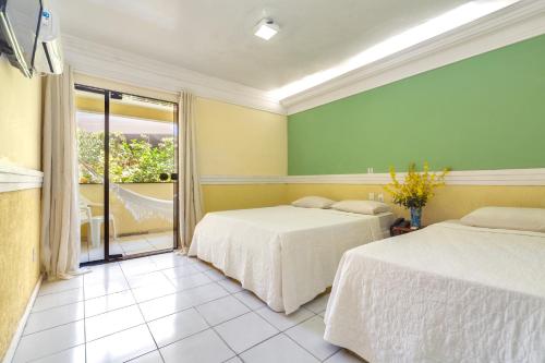 Gallery image of Floral Inn Family in Porto Seguro