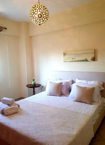 Katil atau katil-katil dalam bilik di Sime Villa Private Beach