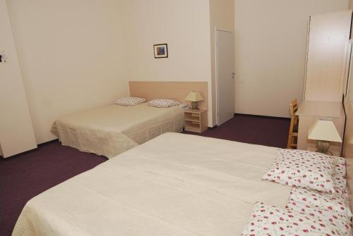 Postel nebo postele na pokoji v ubytování Vilnius centre house
