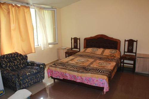 A bed or beds in a room at Getap in Bjni