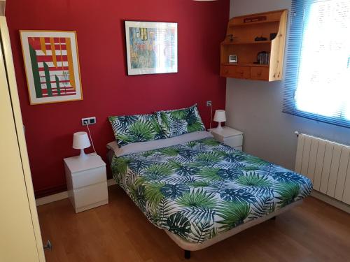 En eller flere senge i et værelse på Casa en Peligros cerca de Granada