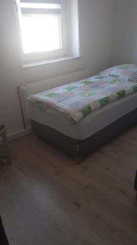 Posteľ alebo postele v izbe v ubytovaní Ferienwohnung2 Grimma