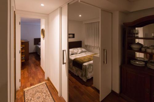 Postel nebo postele na pokoji v ubytování Cobertura Duplex Villa Paulista