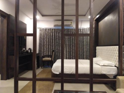 Poschodová posteľ alebo postele v izbe v ubytovaní MPT Tourist Motel, Dodi