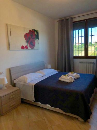 Postel nebo postele na pokoji v ubytování Colle Del Sole