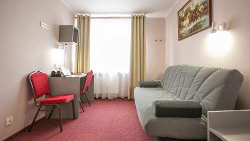 Χώρος καθιστικού στο Hotel Unibus
