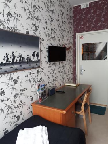 TV a/nebo společenská místnost v ubytování Hostel River