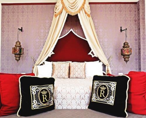 Postel nebo postele na pokoji v ubytování Rasa Boutique Hotel Chiang Rai