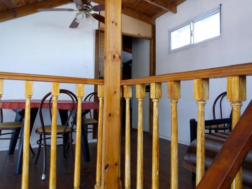 a dining room with a table and chairs at Bicicleteria Don Perez in San Isidro