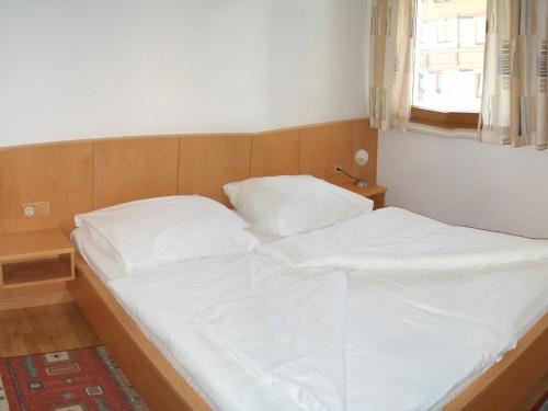 Katil atau katil-katil dalam bilik di Appartements Hirner