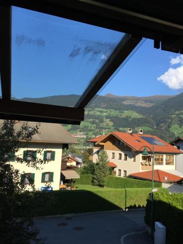 a view from the window of a house at Ferienwohnung Mauracher Kirer Haus in Fügen